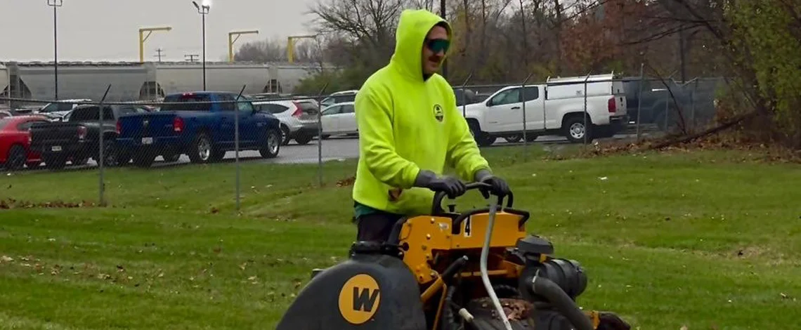 Landscaping for Businesses 1 man doing lawn maintenance